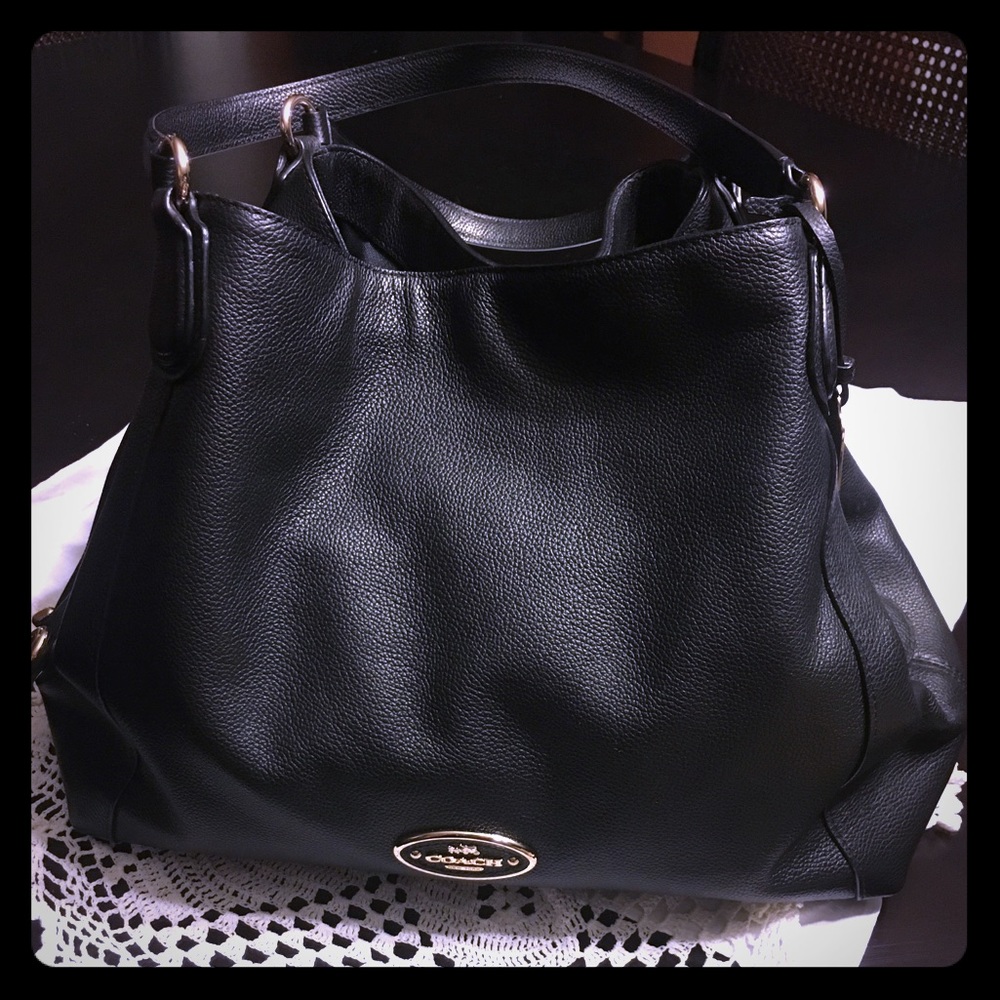 Coach pebbled black leather shoulder bag.